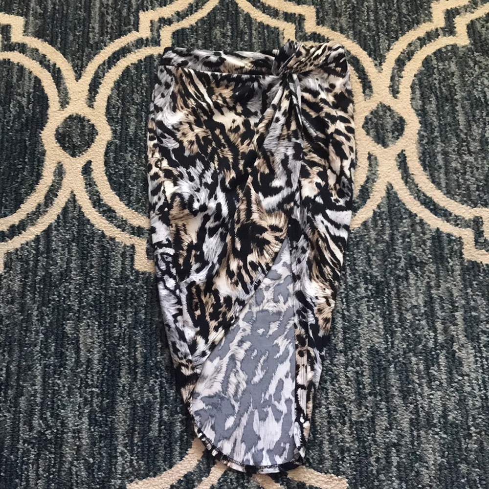 Animal print polyester and spandex skirt. Worn 1x